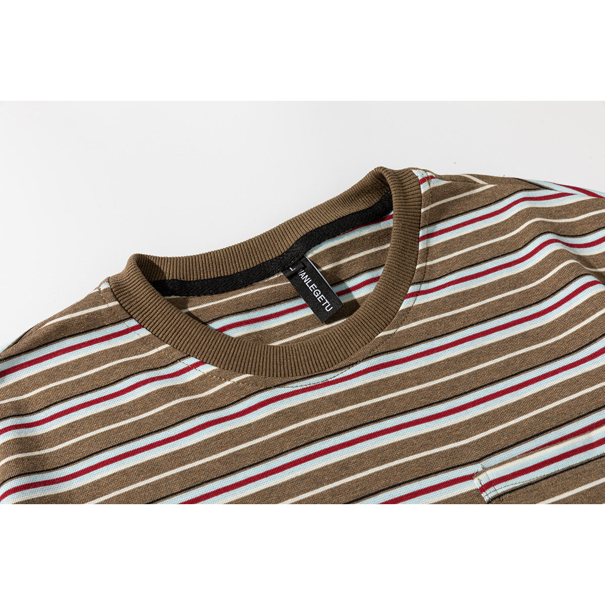 Close-up of a brown striped crew-neck T-shirt showing its ribbed collar and inner neck label.