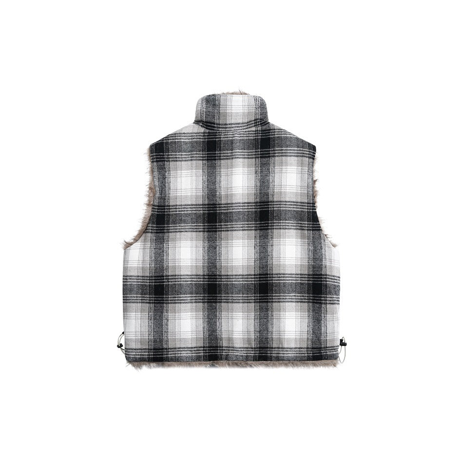Back of a sleeveless vest with a black, gray and white plaid pattern and fur trim.
