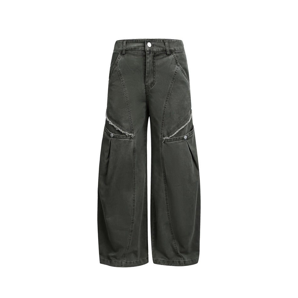 Front view of charcoal wide-leg pants with curved panel seams, distressed knee openings and silver buttons.