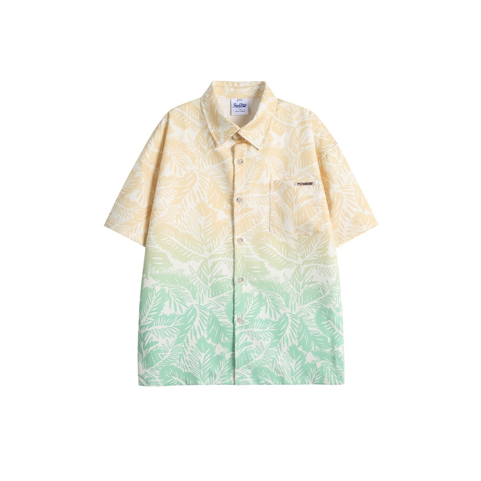 Short-sleeve button-up shirt with leaf print fading from cream-yellow to mint green, flat front view