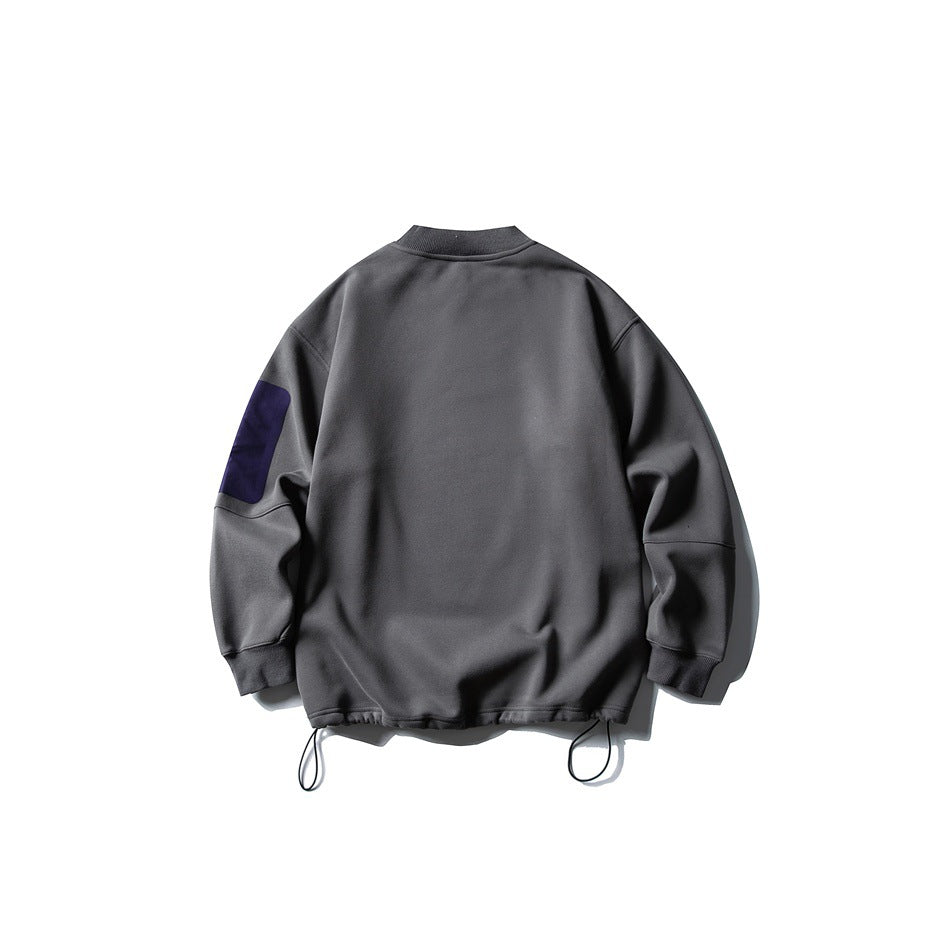 Back view of a charcoal sweatshirt with a purple sleeve panel, ribbed cuffs, and adjustable drawcords at the hem.
