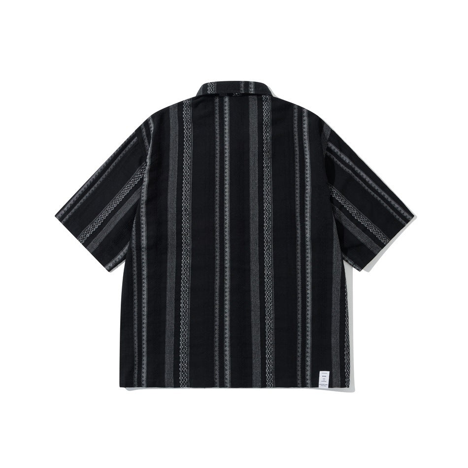 Back view of a black short-sleeve button-up shirt with vertical gray patterned stripes.