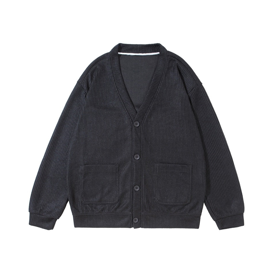 Black-gray ribbed knit V-neck cardigan with four buttons and two patch pockets, flat front view