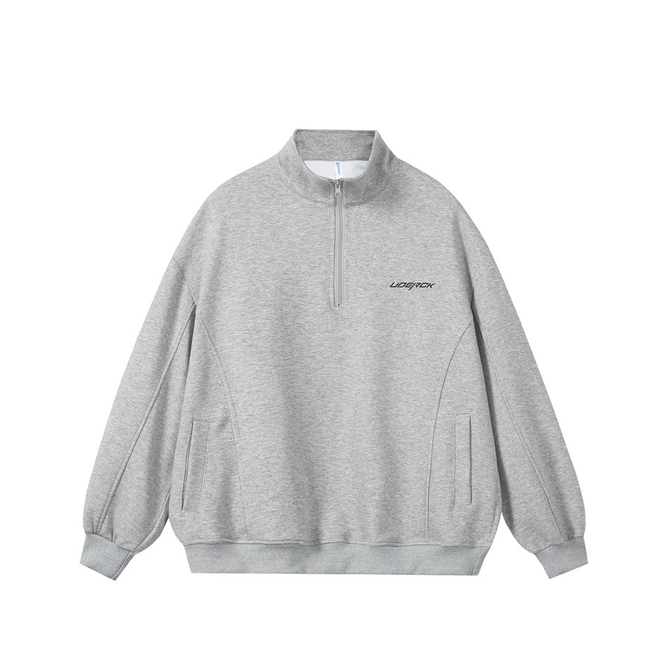 Front view of a heather-gray quarter-zip pullover with a stand collar, side pockets, and ribbed trims.