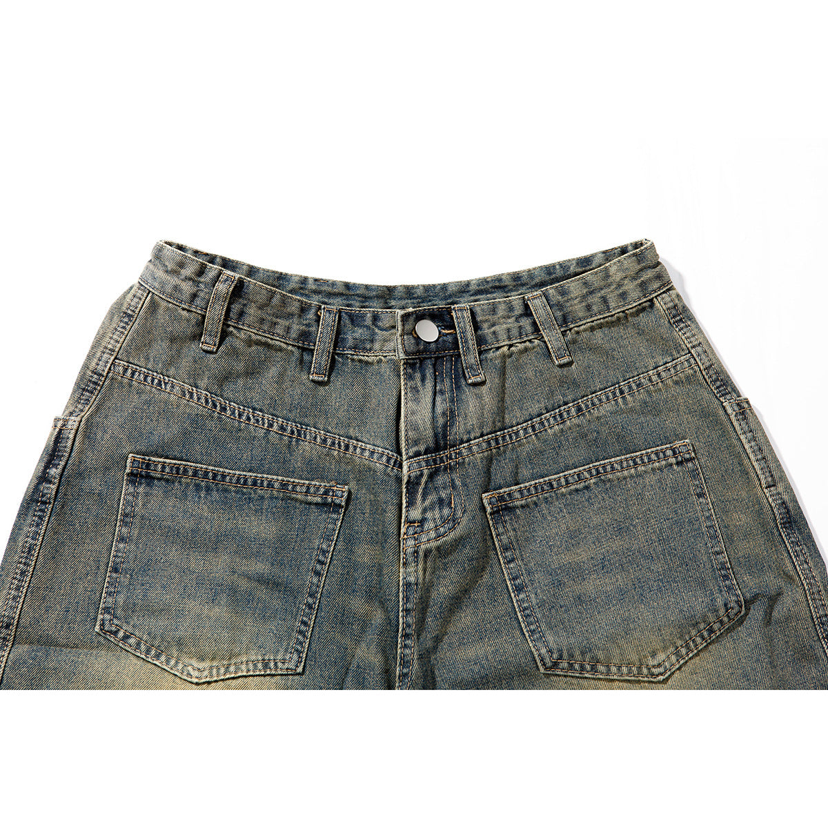 Close-up of the back waistband and patch pockets on mottled blue-brown washed denim shorts.