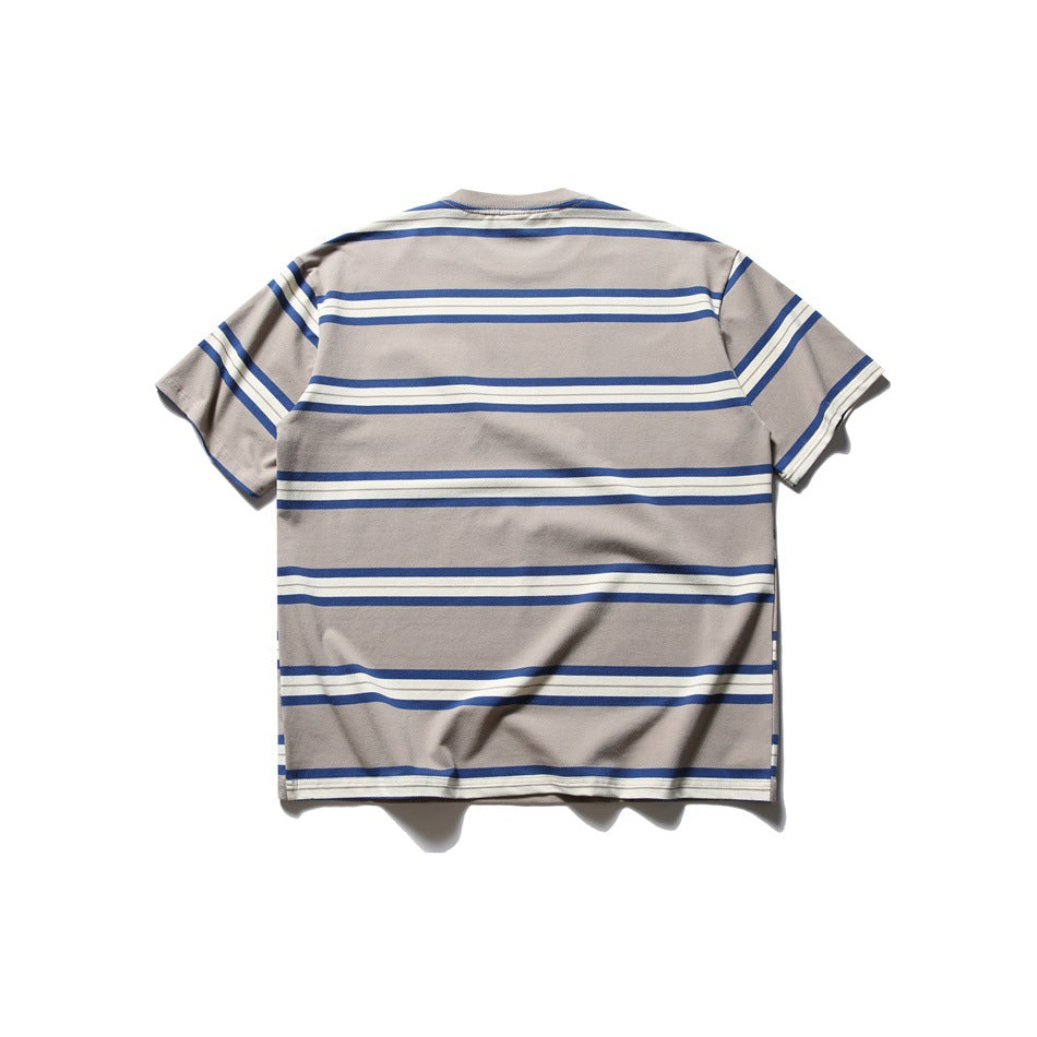 Back view of a taupe short-sleeve T-shirt with horizontal blue and ivory stripes.