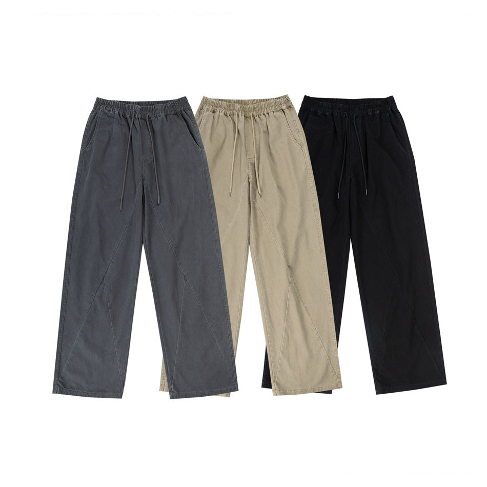 Three pairs of wide-leg drawstring trousers shown flat in charcoal gray, beige, and black.