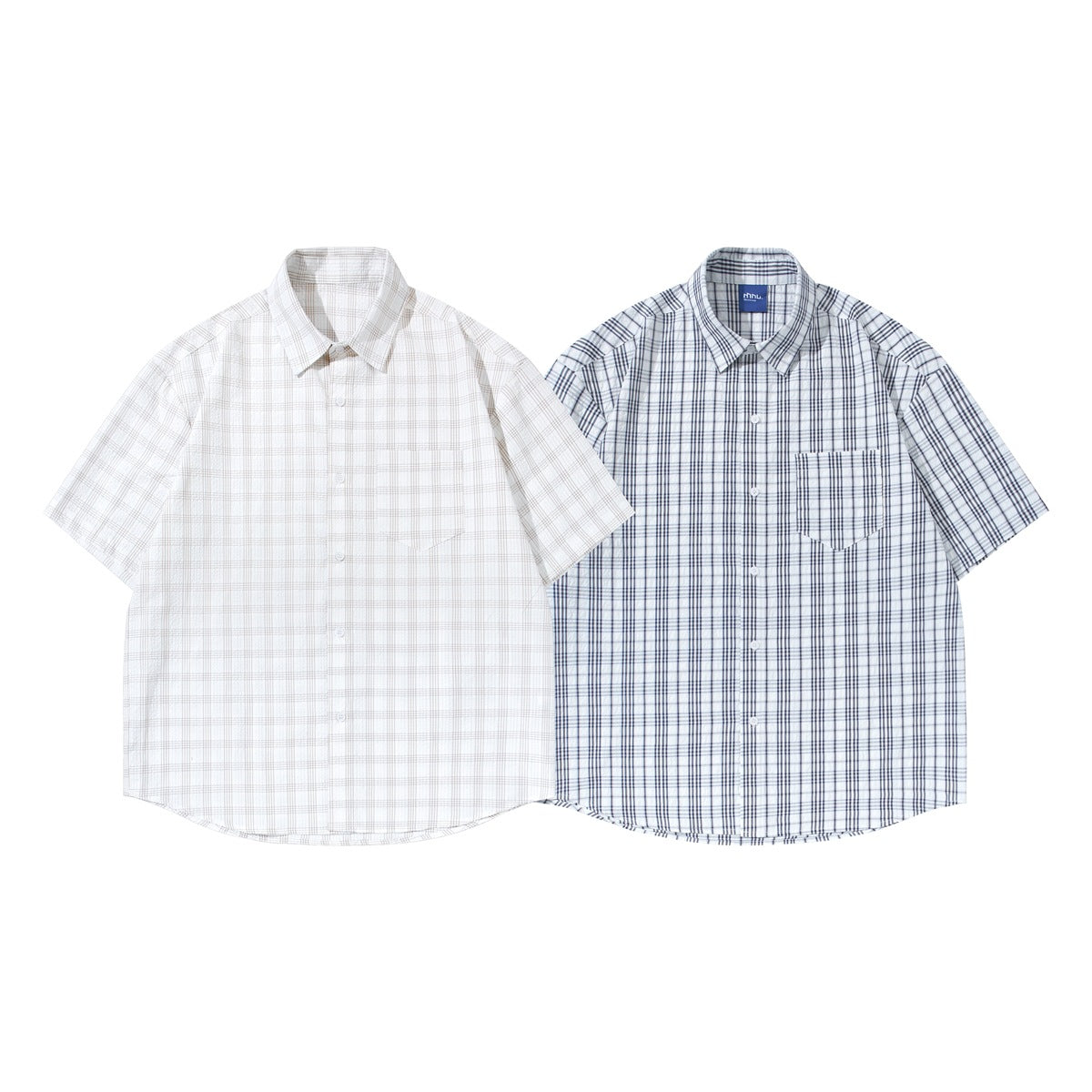 Two short-sleeve button-up shirts shown from the front: one in light neutral plaid and one in blue-gray plaid.