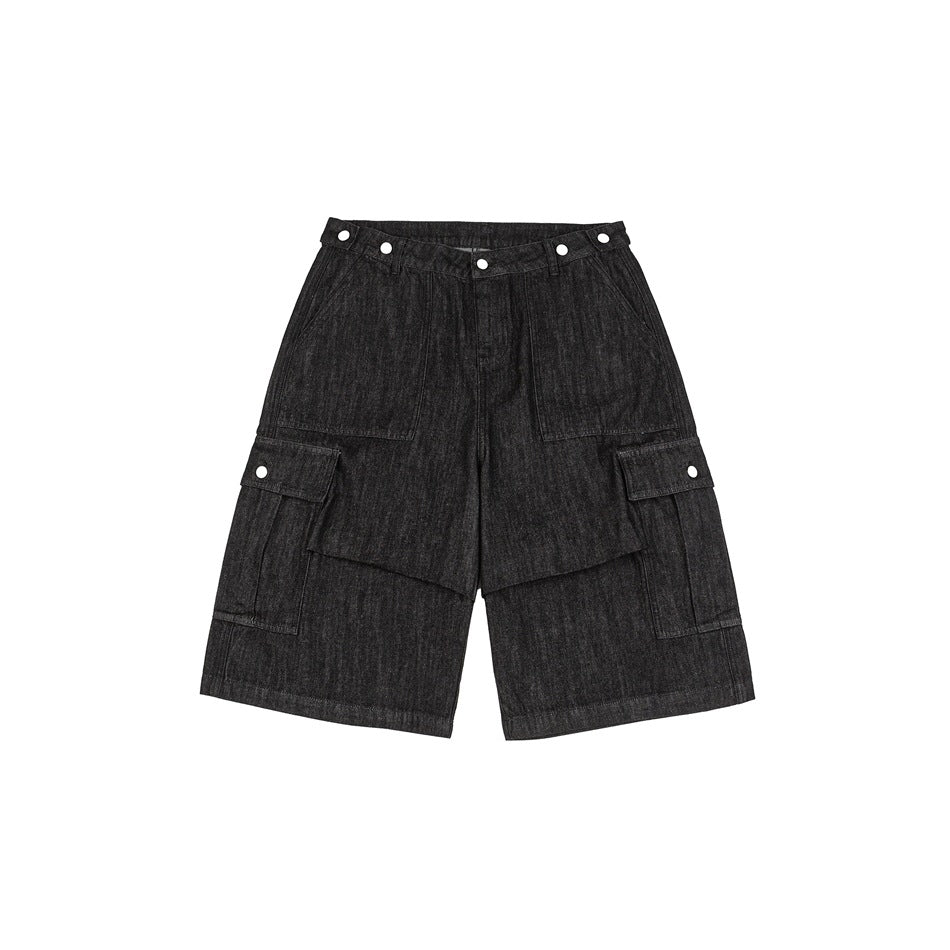Black washed denim knee-length cargo shorts, front flat lay, with flap cargo pockets and snap waist tabs