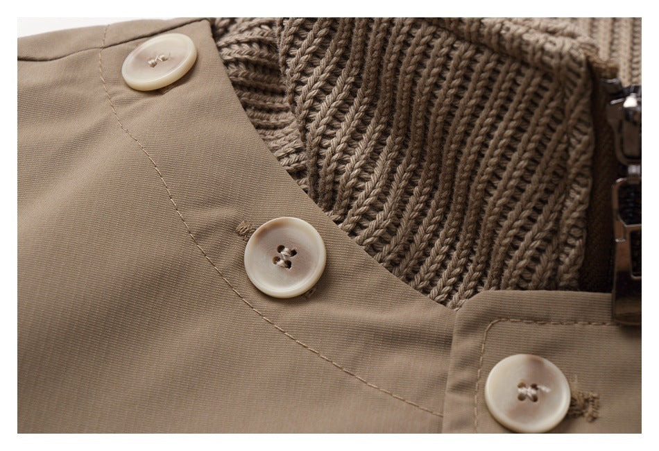 Close-up of the tan coat's buttoned collar, rib-knit inner collar, and zipper.