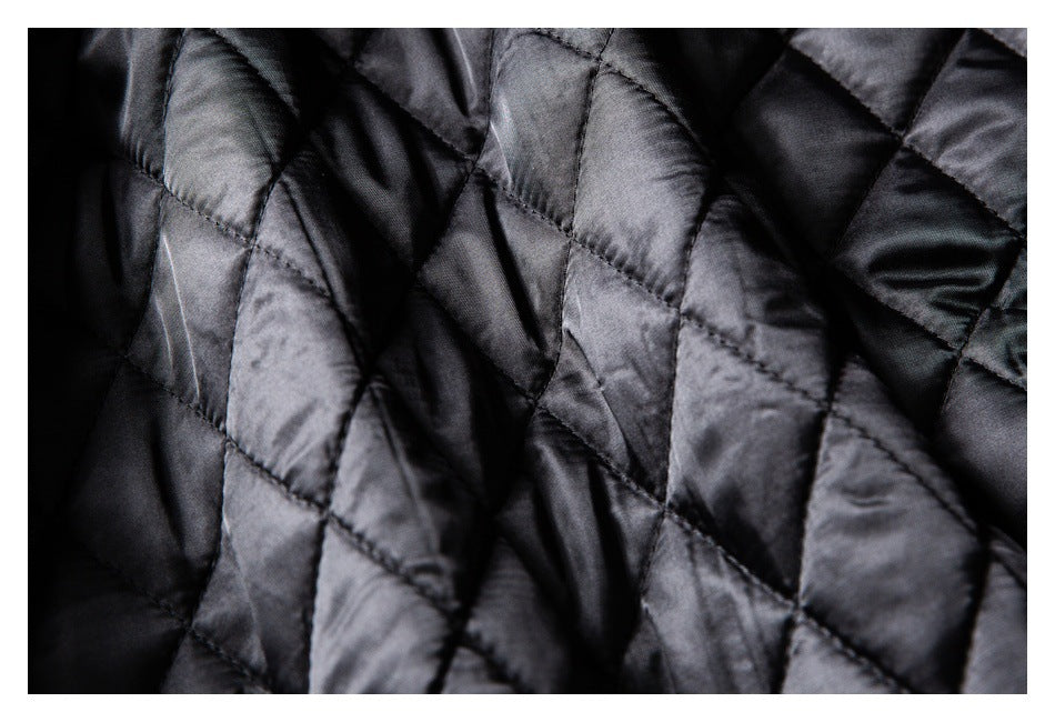 Close-up of the jacket's black diamond-quilted lining.