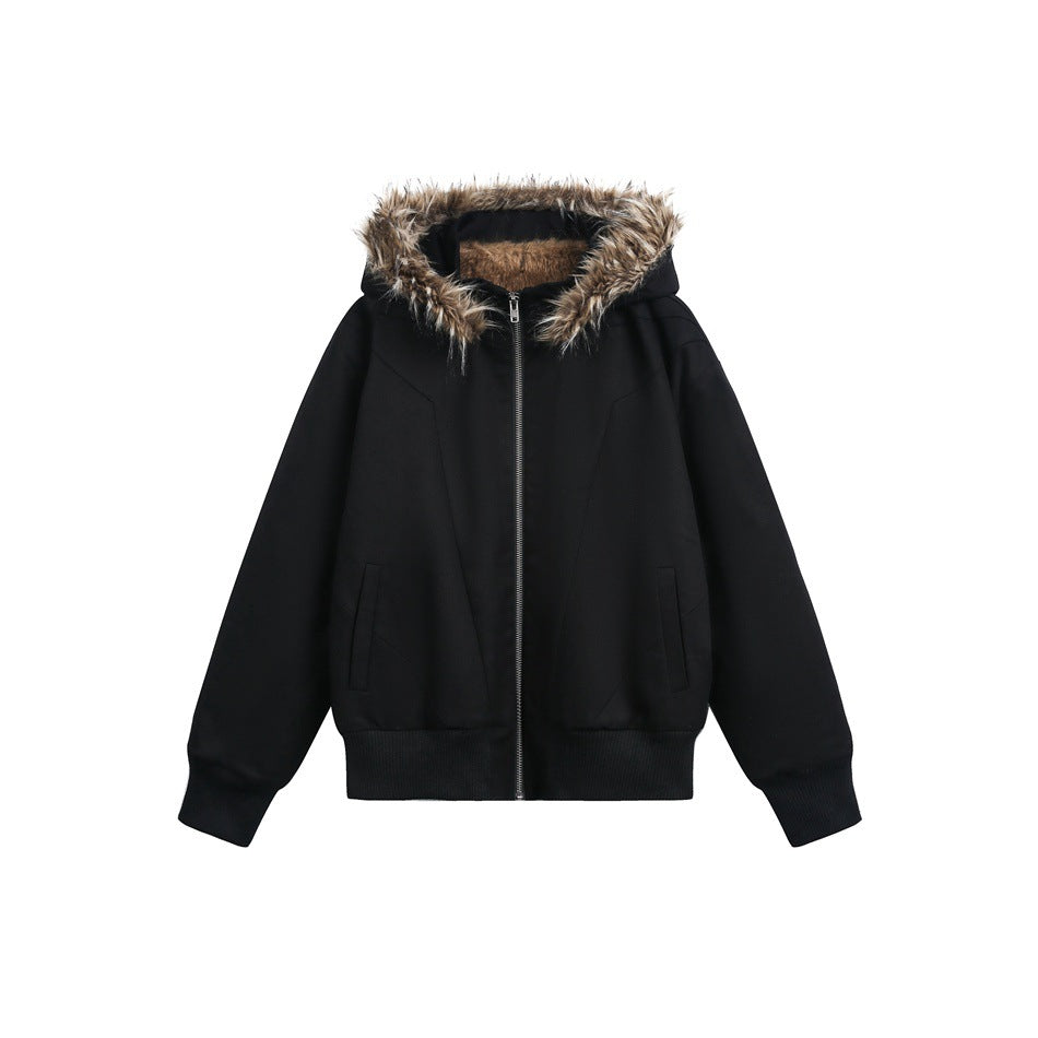 Front view of a black zip-up hooded jacket with brown fur trim, front pockets and ribbed cuffs and hem.