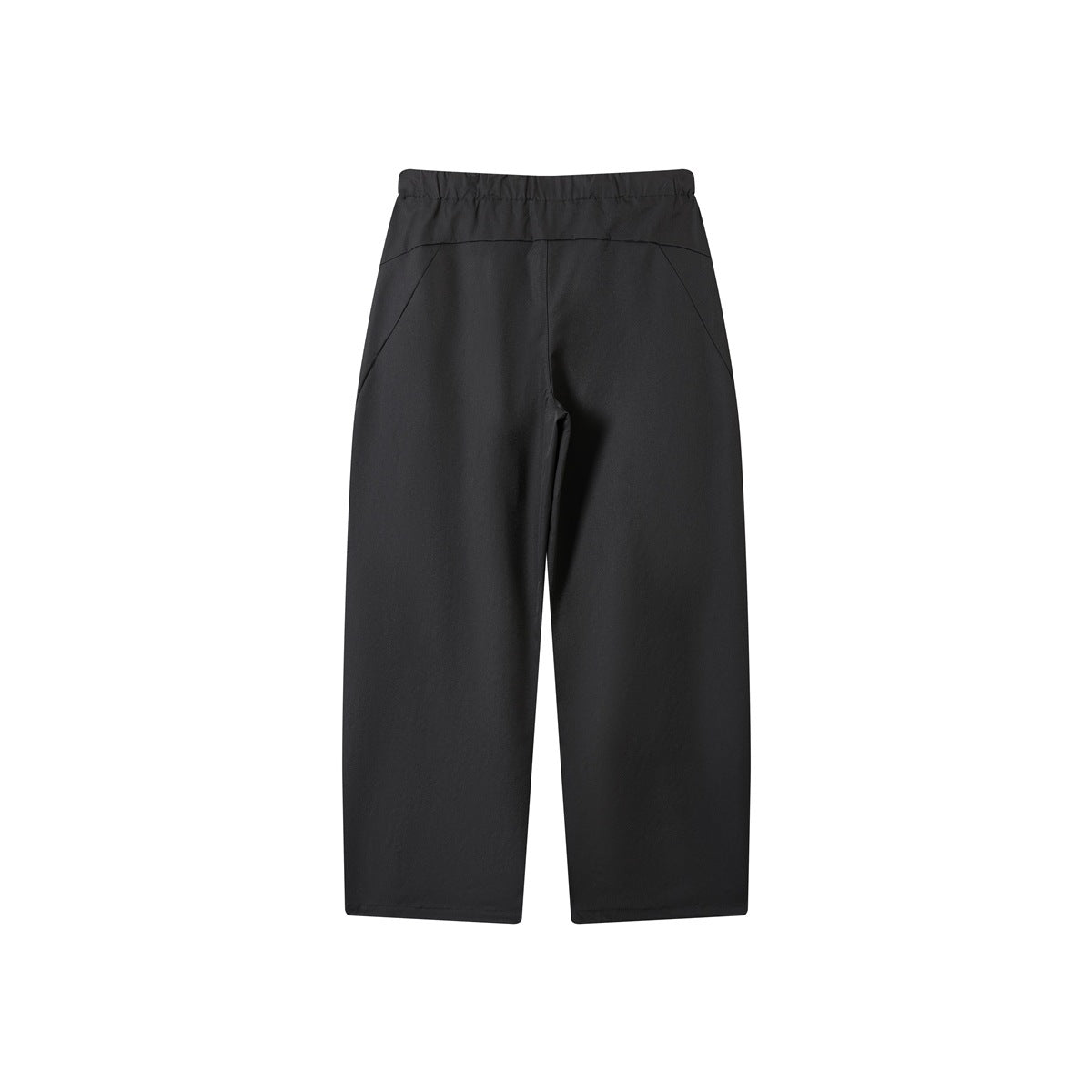Black wide-leg trousers flat lay, back view, with elastic waistband and curved seam lines