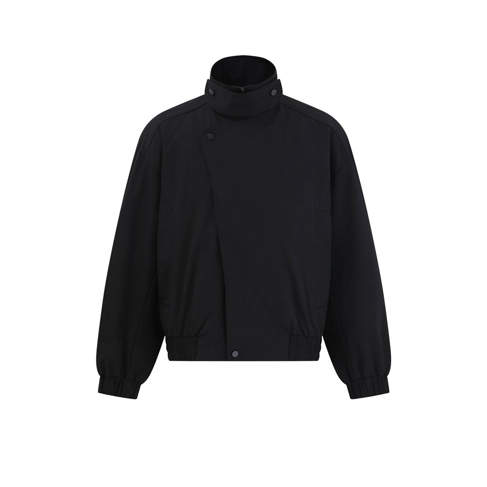 Front view of a black jacket with a high stand collar, snap-button placket, side pockets, and elastic cuffs and hem.
