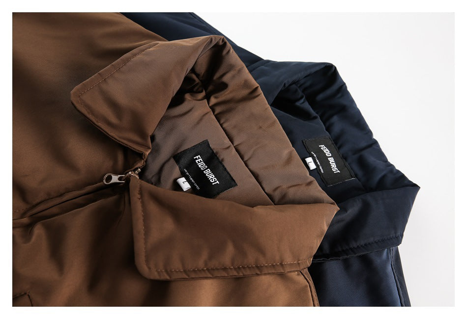 Close-up of brown and navy jackets showing their collars, zipper, and sewn-in labels.
