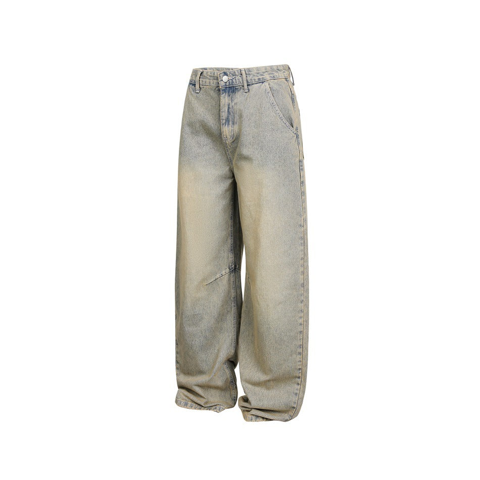 Front view of pale, faded blue-gray wide-leg jeans with a button closure, belt loops, and curved front pockets.