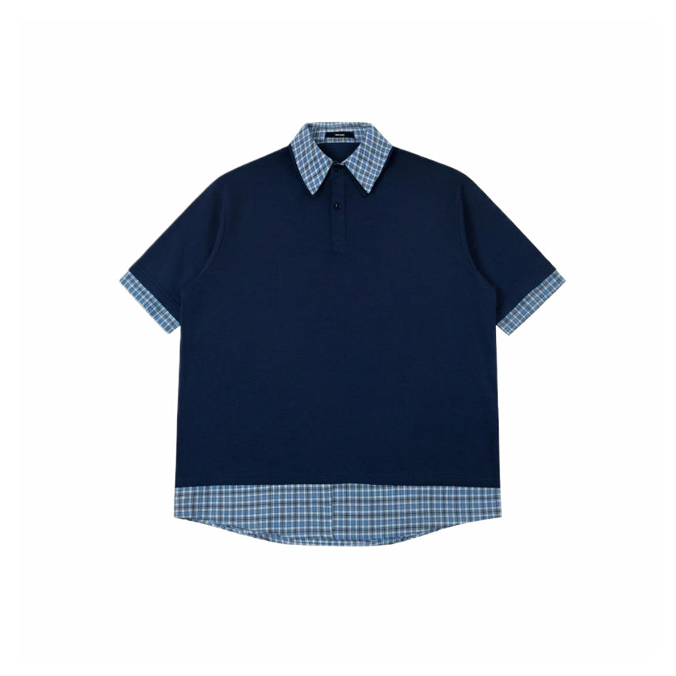 Navy short-sleeve polo top with blue plaid collar, sleeve cuffs and layered plaid hem, flat lay front view