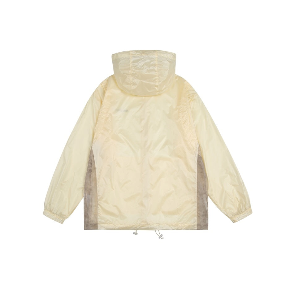Back view of a pale cream hooded jacket with mesh side panels and elastic cuffs, isolated on white.