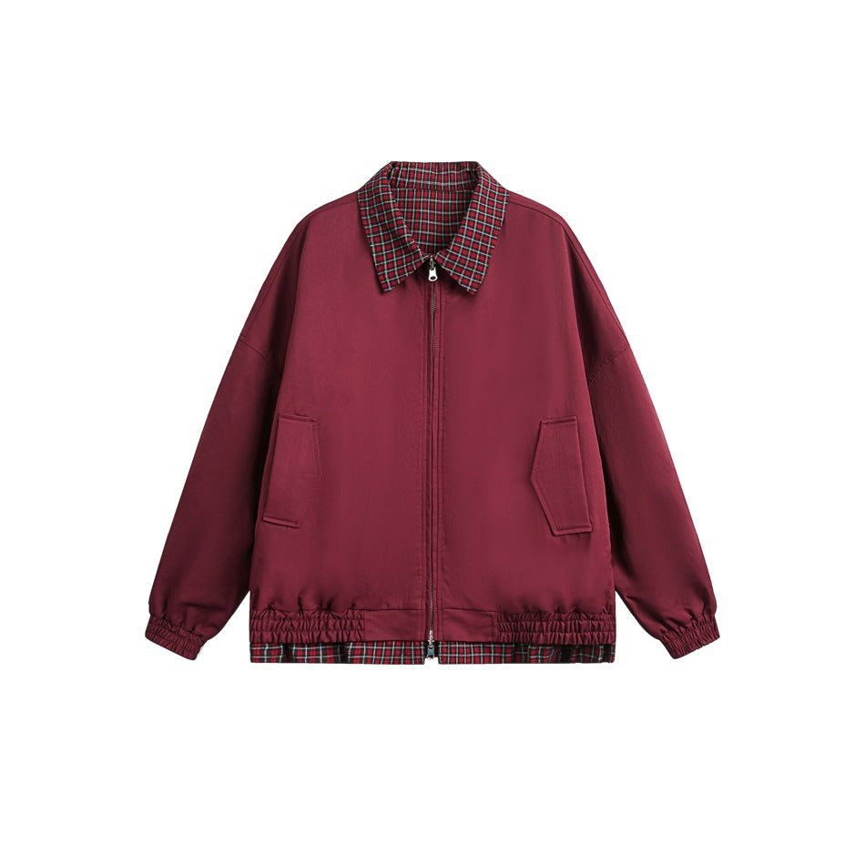 Front view of a burgundy jacket with a plaid collar and hem trim, zip closure, and two front pockets.