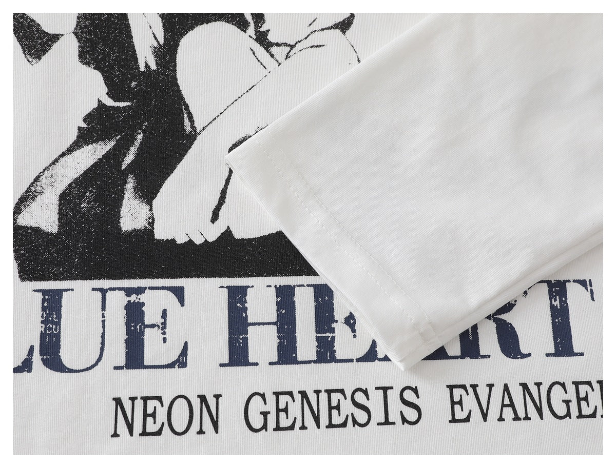 Close-up of a white T-shirt sleeve and black graphic with large English lettering.