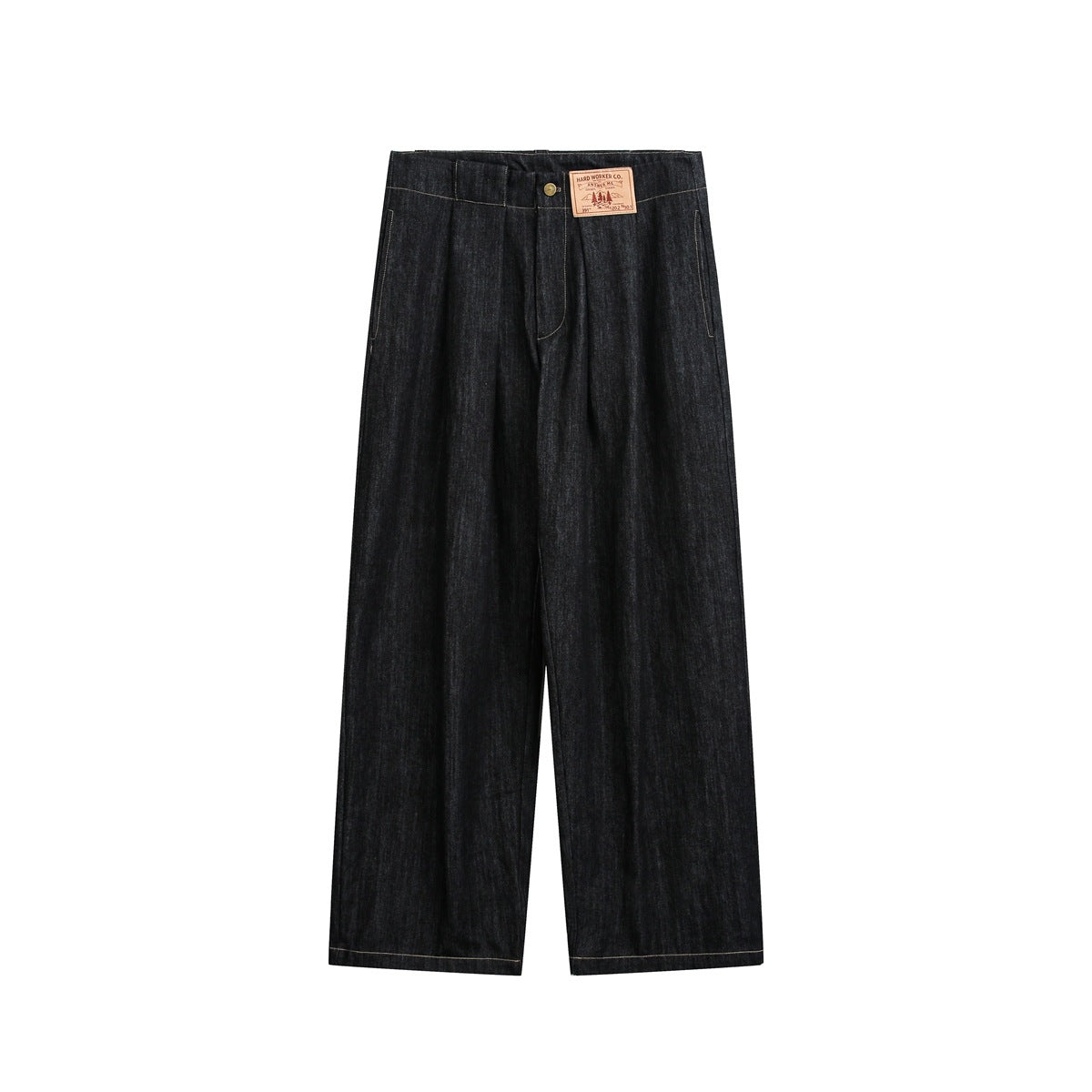 Front view of black wide-leg pleated denim jeans with tan topstitching and a patch at the waistband