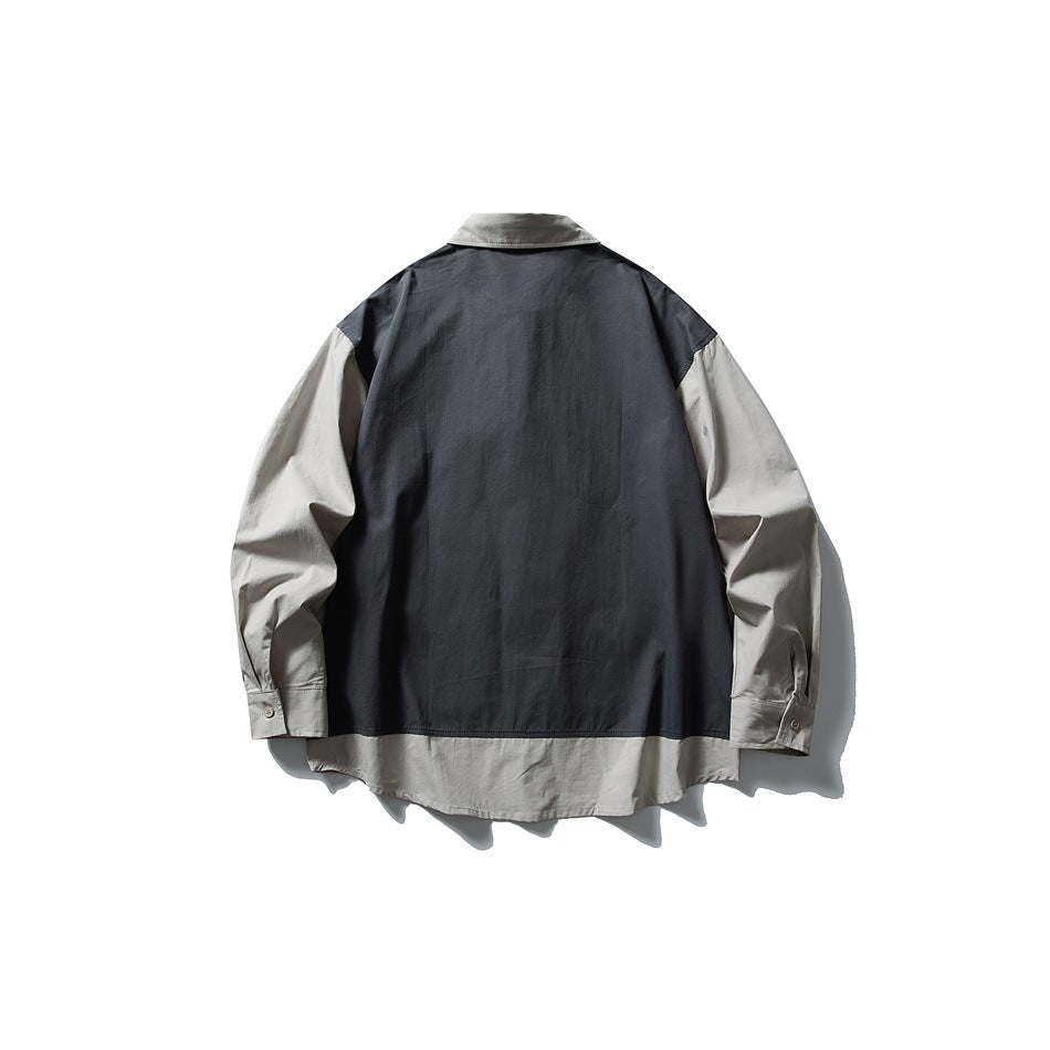Back view of navy and khaki layered shirt with contrast sleeves and hem, flat lay