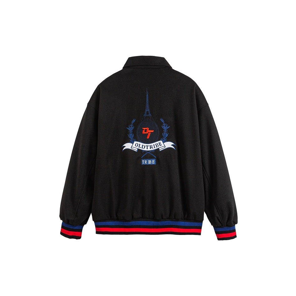 Back view of a black jacket with an embroidered crest and red-and-blue striped cuffs and hem.