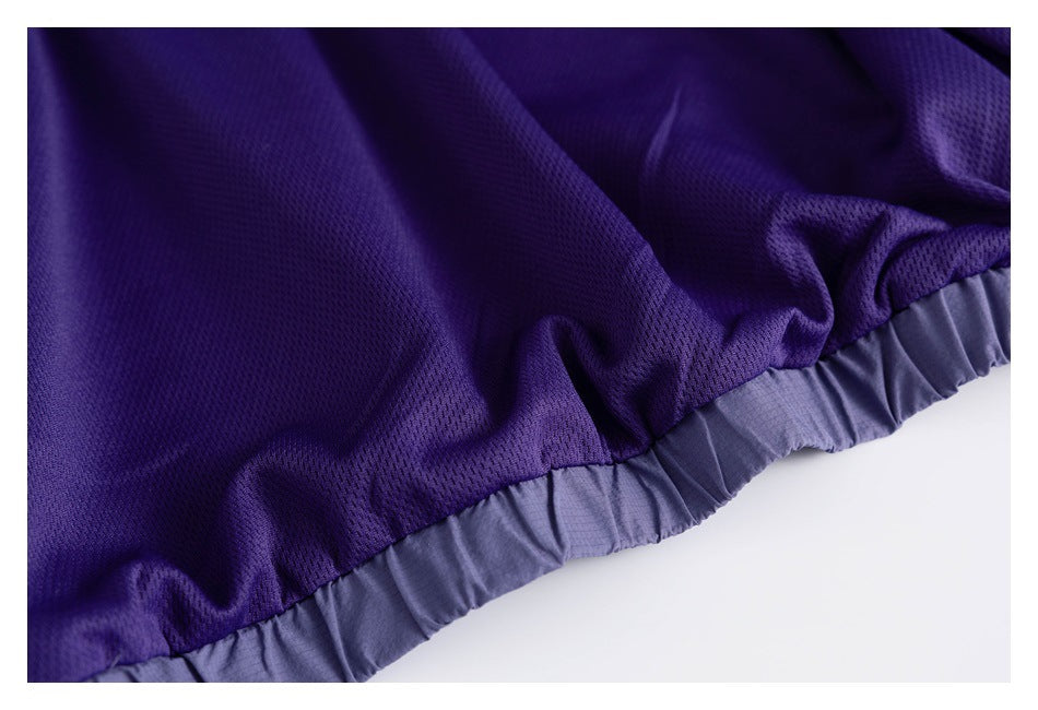 Close-up of purple mesh lining joined to a gathered lavender edge.