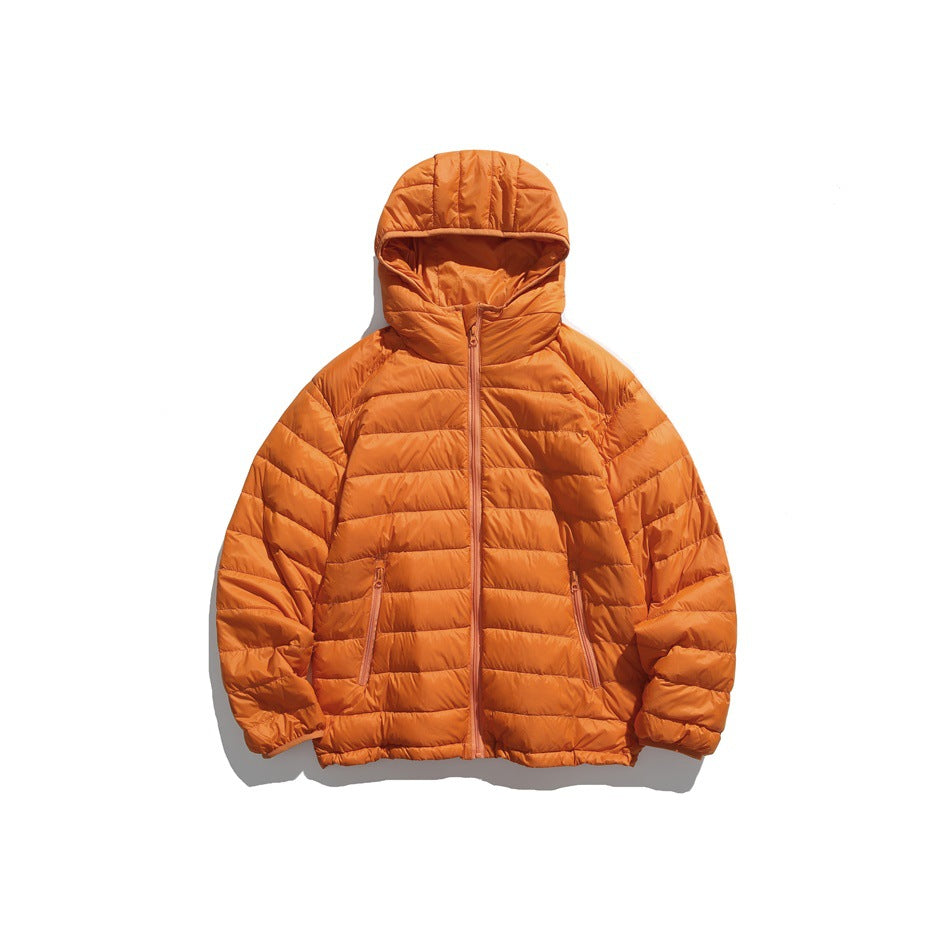Orange hooded quilted puffer jacket, front flat view with center zipper and zip pockets