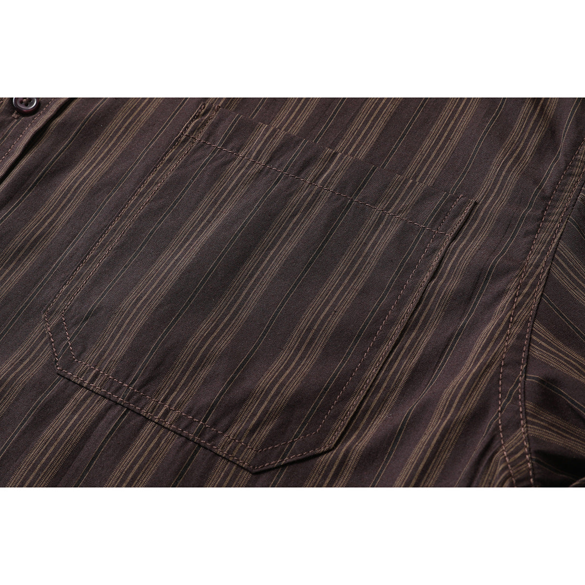 Close-up of the dark brown striped shirt's stitched chest pocket and button placket.
