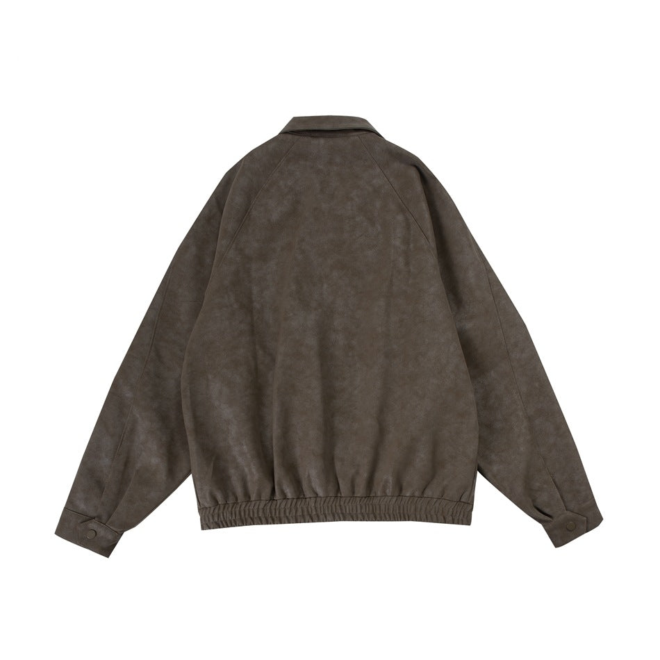 Back flat lay of a taupe-brown jacket with raglan sleeves, buttoned cuffs, and an elasticated hem.
