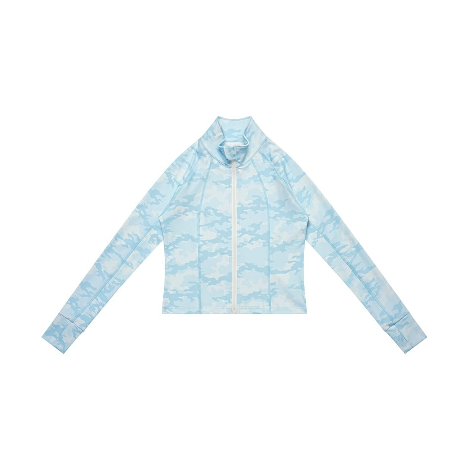 Light blue camouflage zip-up cropped jacket with stand collar and white zipper, flat lay front view