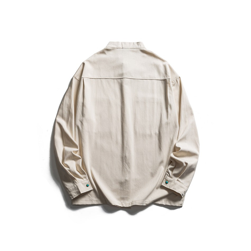 Beige stand-collar long-sleeve shirt, back flat lay with yoke seam and cuff snaps