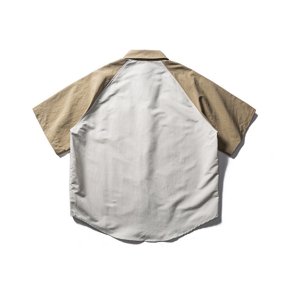 Back view of a short-sleeve shirt with a cream body, tan sleeves, and a tan collar.