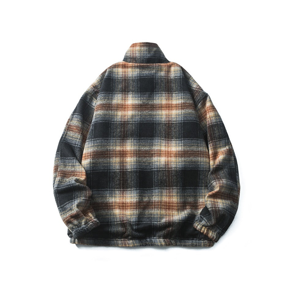 Back view of a jacket laid flat, with a dark plaid pattern in black, gray, cream, and rust.