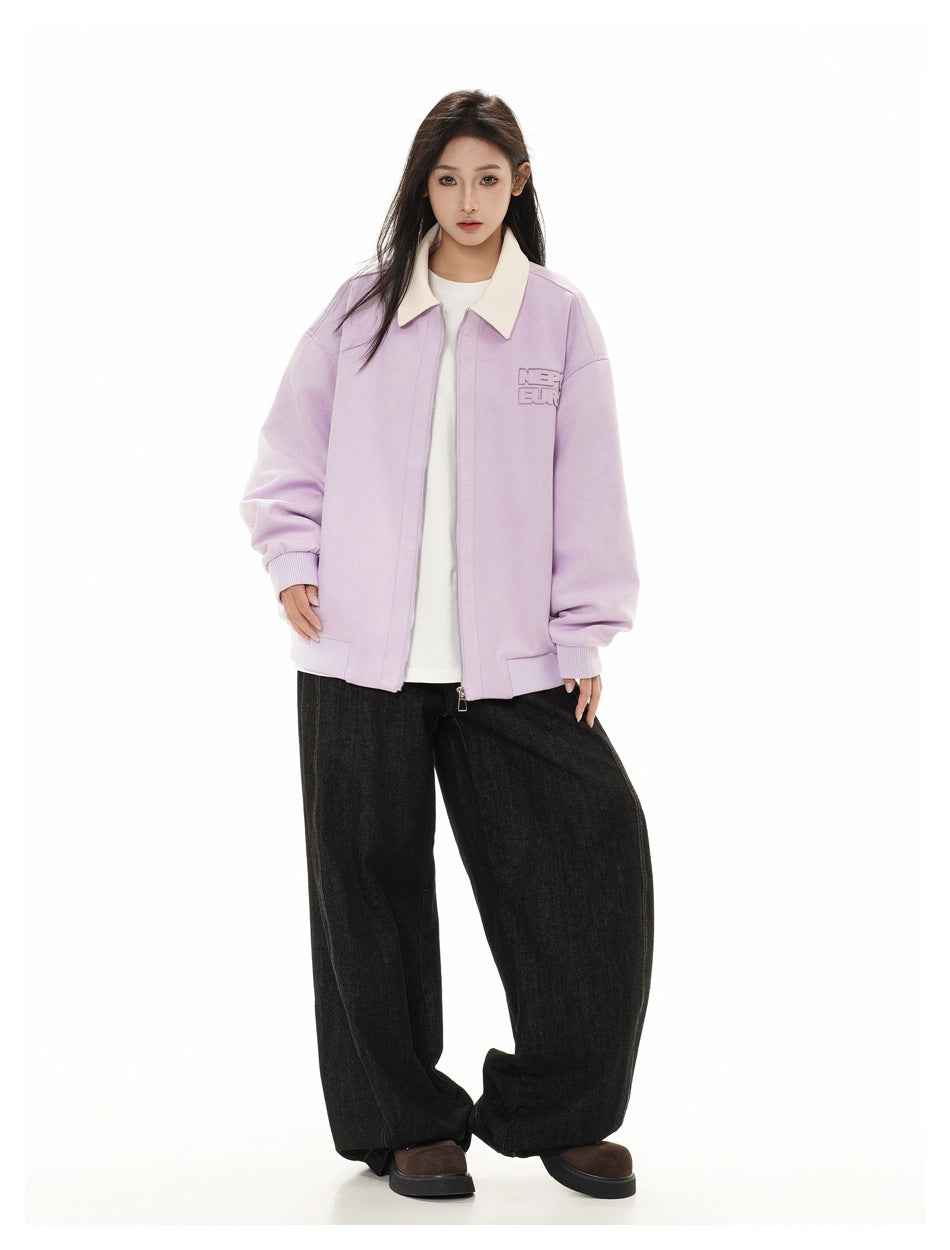 Full-length front view of a model wearing a lilac jacket with a cream collar, white shirt, and loose black trousers.