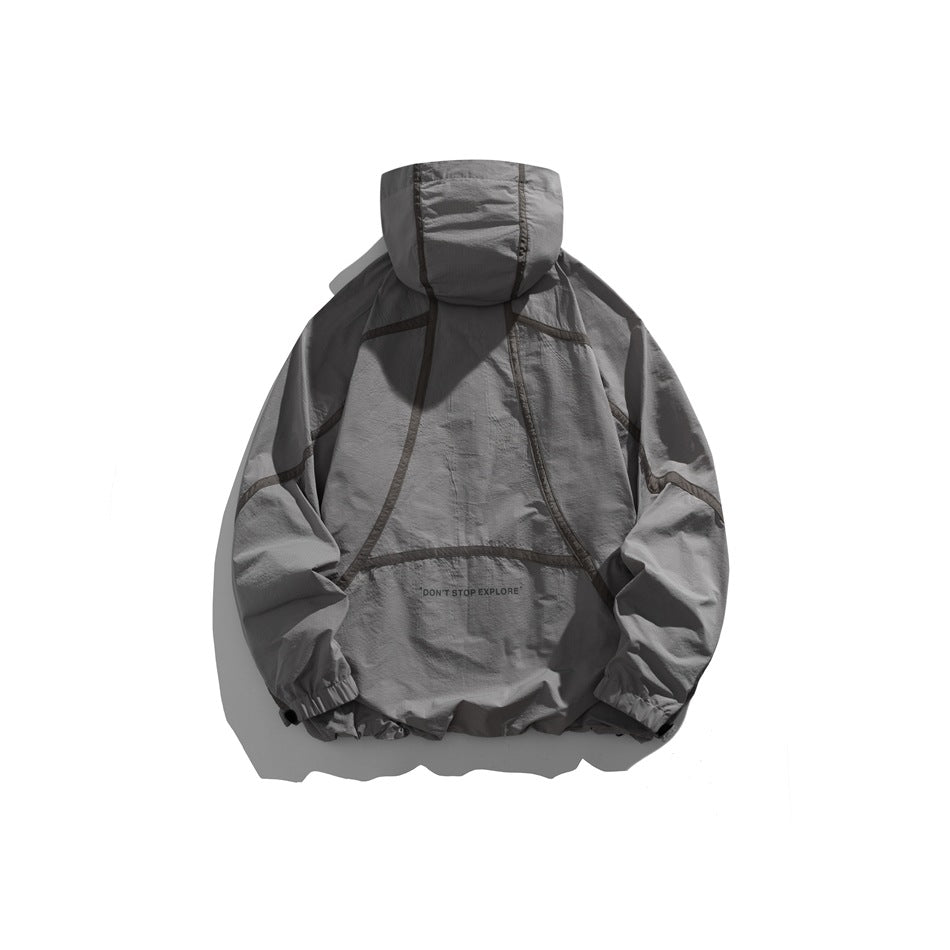 Gray hooded pullover jacket shown from the back, with dark seam detailing and elastic cuffs.