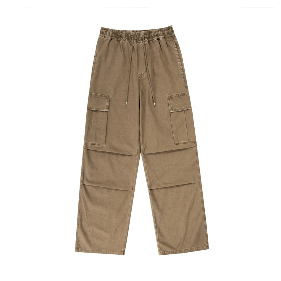 Khaki wide-leg cargo pants with elastic drawstring waist, thigh flap pockets and knee pleats, flat front view