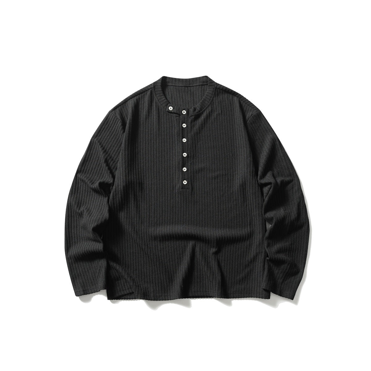 Black ribbed-knit long-sleeve Henley top with six buttons, flat lay front view