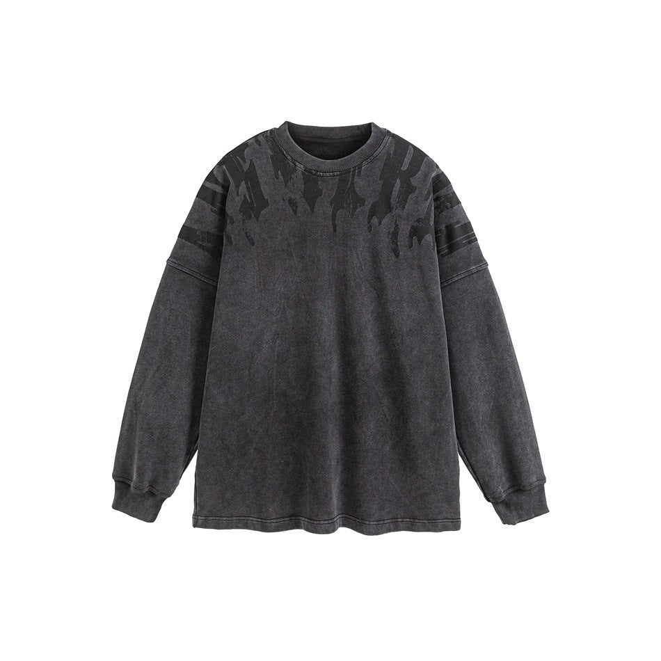 Washed charcoal gray crew-neck sweatshirt flat lay with tonal black print across the shoulders and yoke