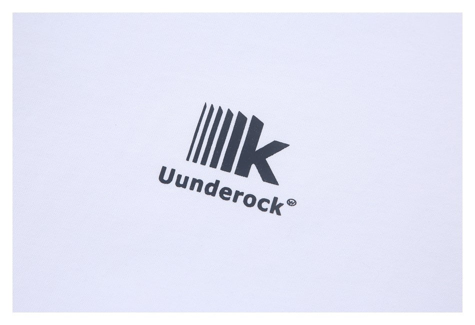Close-up of a black stylized logo and the word “Uunderock” printed on white fabric.