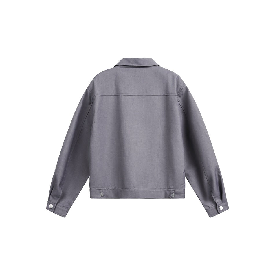 Back view of a gray collared jacket with long sleeves, snap cuffs, and a snap-detail hem.