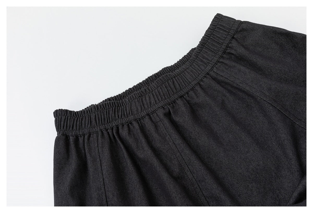 Close-up of the skirt's gathered elastic waistband and stitched seams.