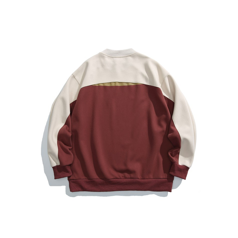 Back of a color-block crewneck sweatshirt, with a burgundy body and ivory sleeves and upper back.