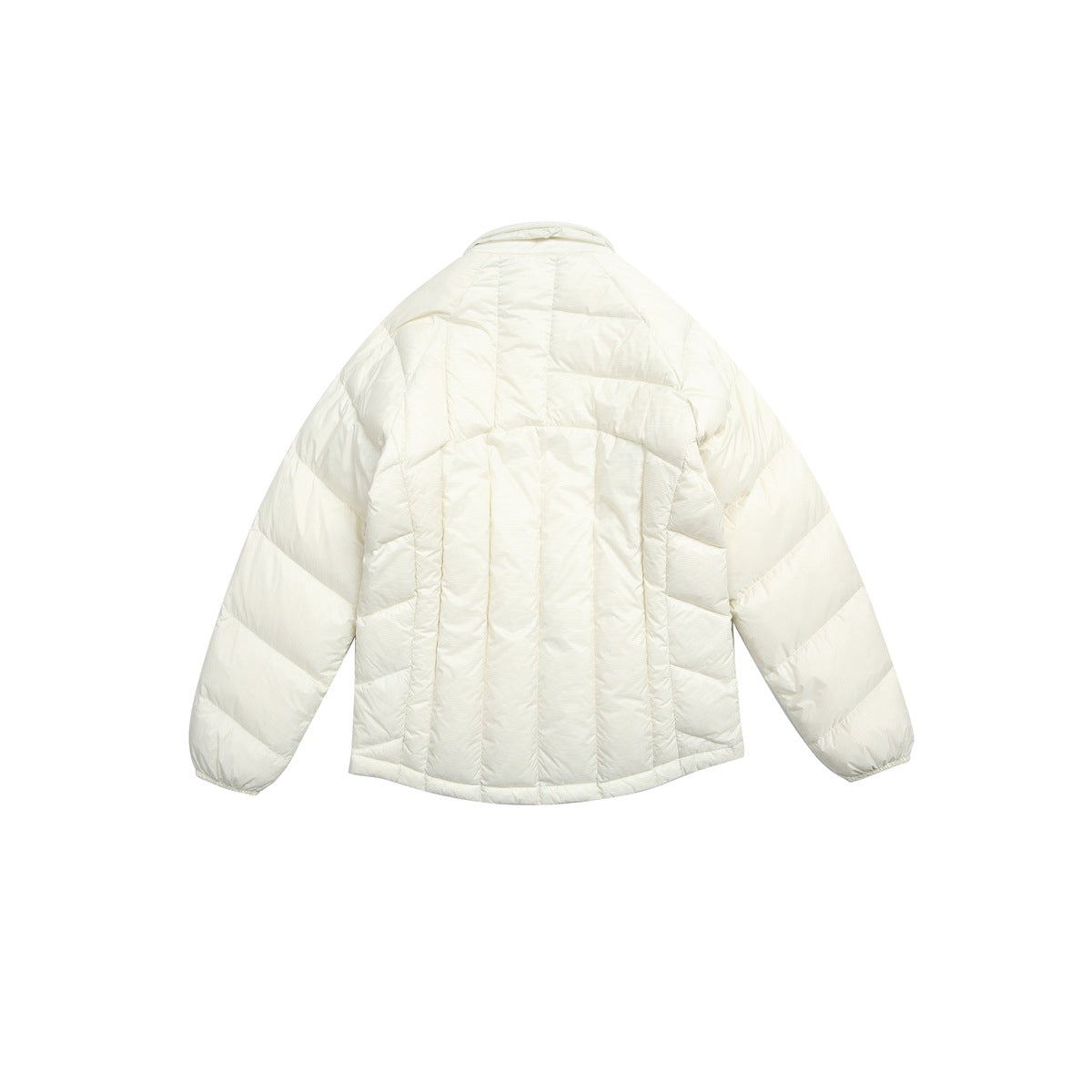 Back view of an ivory quilted jacket with long sleeves and a curved hem, shown on white.
