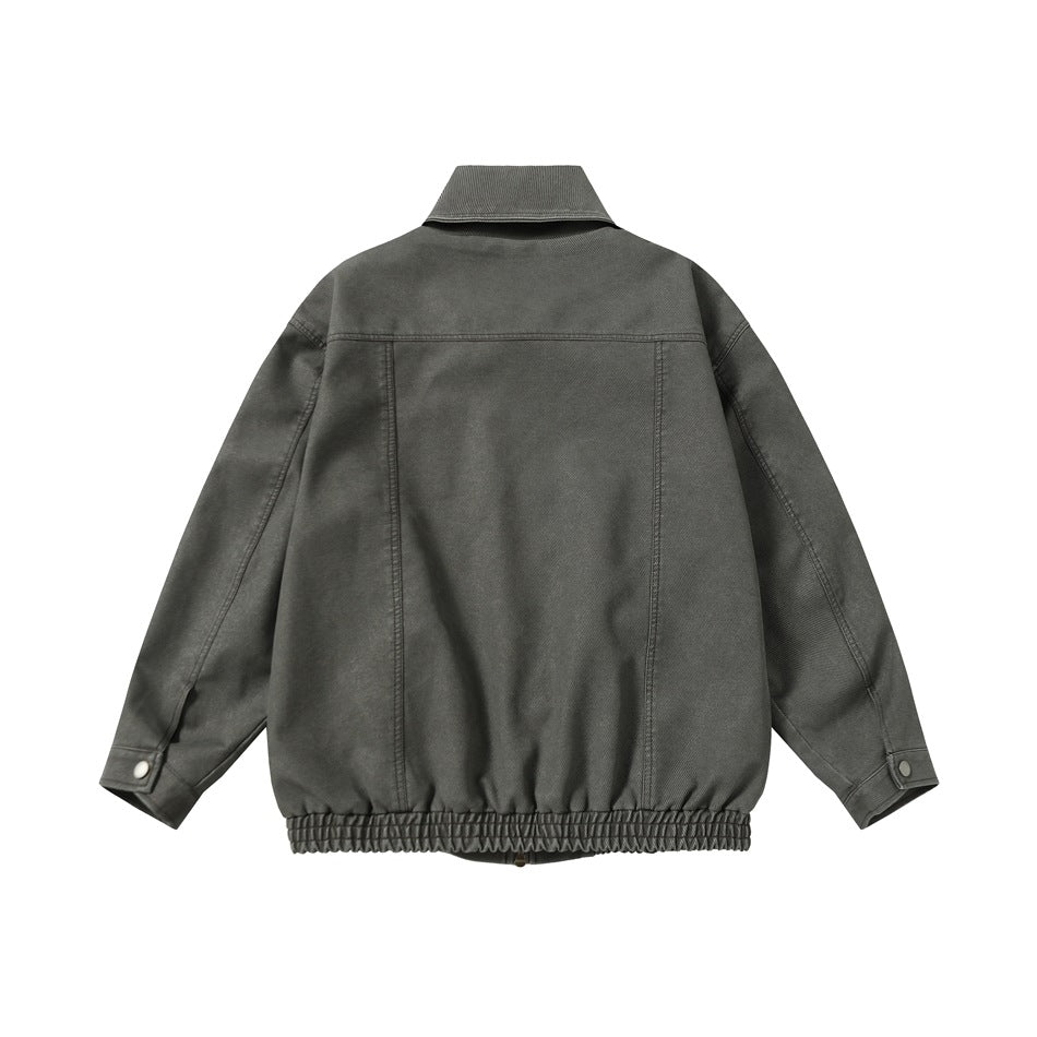 Back view of gray collared jacket with back yoke seam, snap cuffs and elastic hem