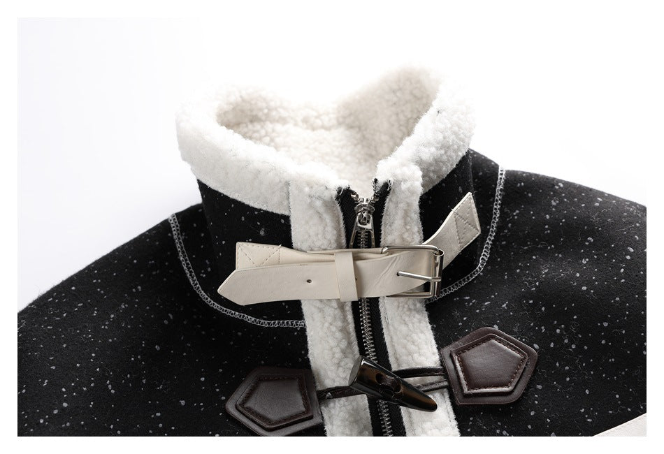 Close-up of the coat's cream fleece collar, ivory buckle strap, front zipper and dark toggle fasteners.