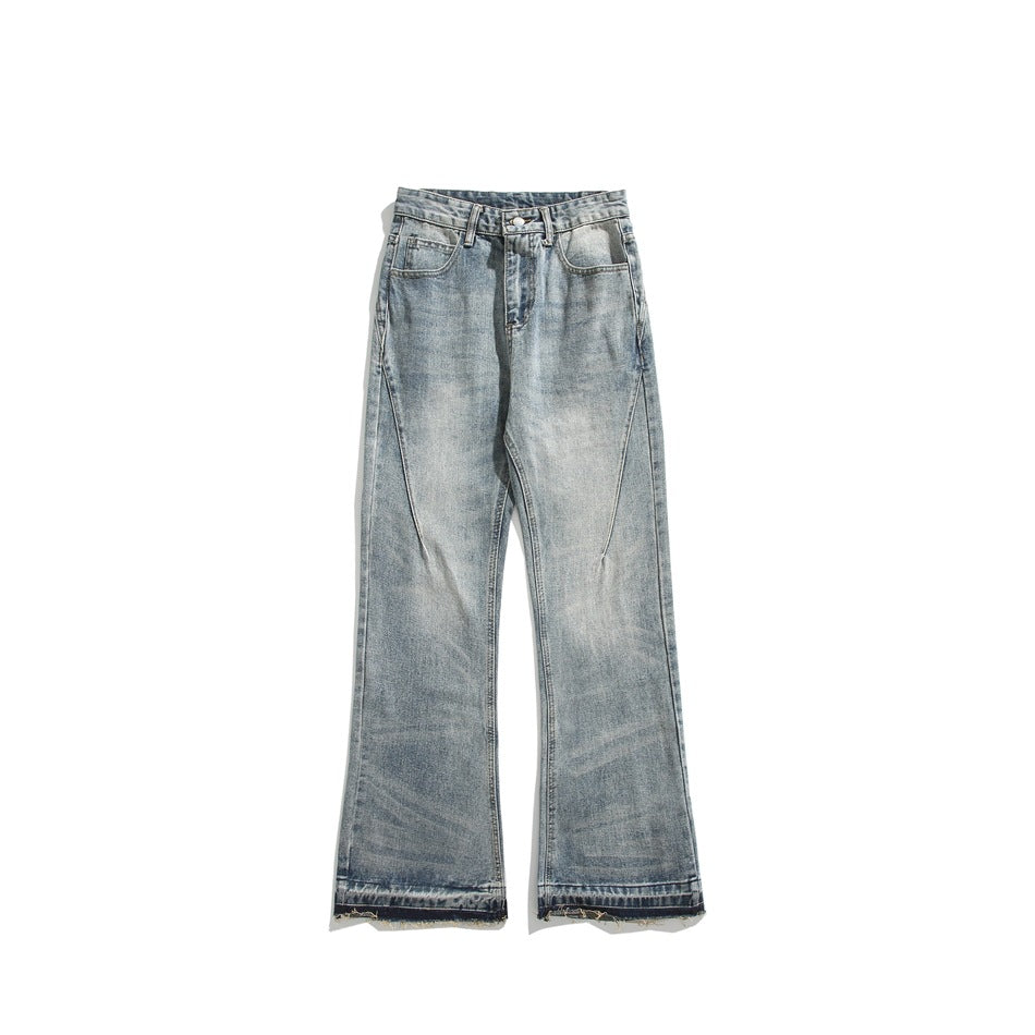 Washed blue faded flared jeans, front flat lay, with frayed raw hem