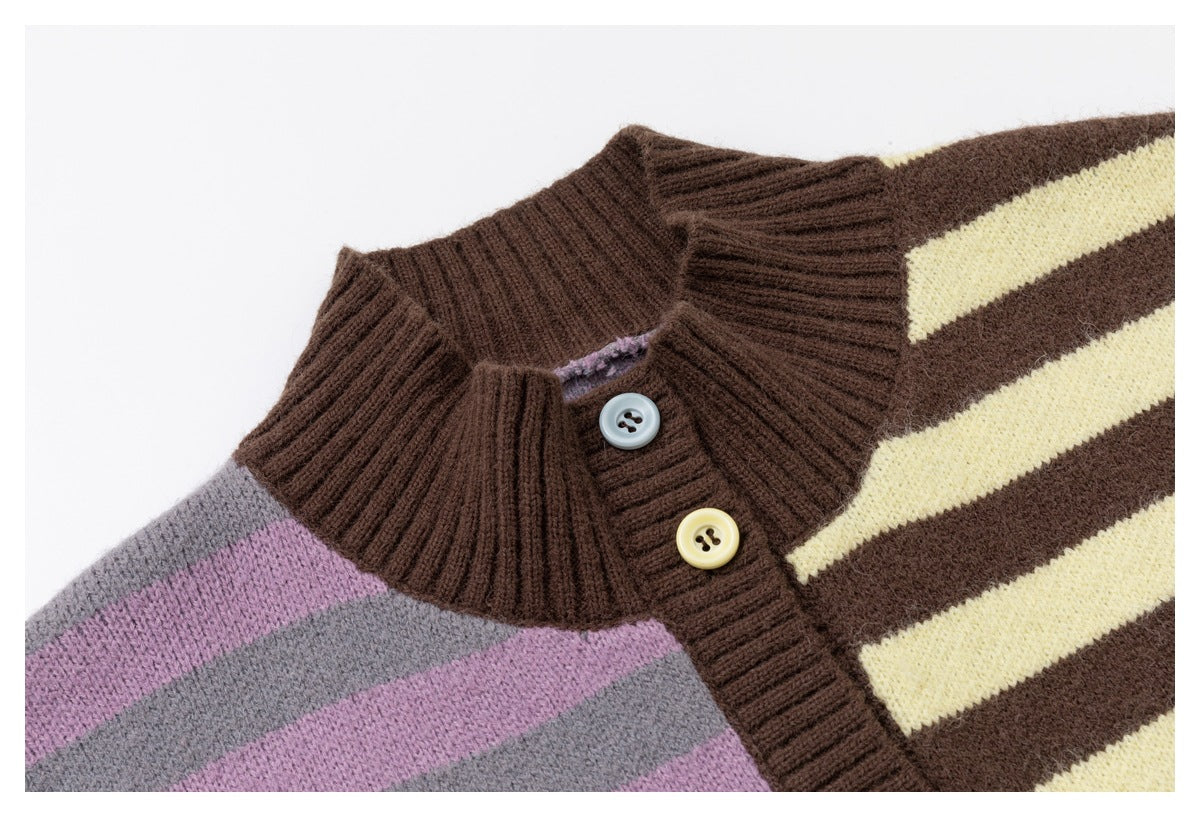 Close-up of a cardigan's brown ribbed collar and button placket with cream, brown, mauve, and gray stripes.