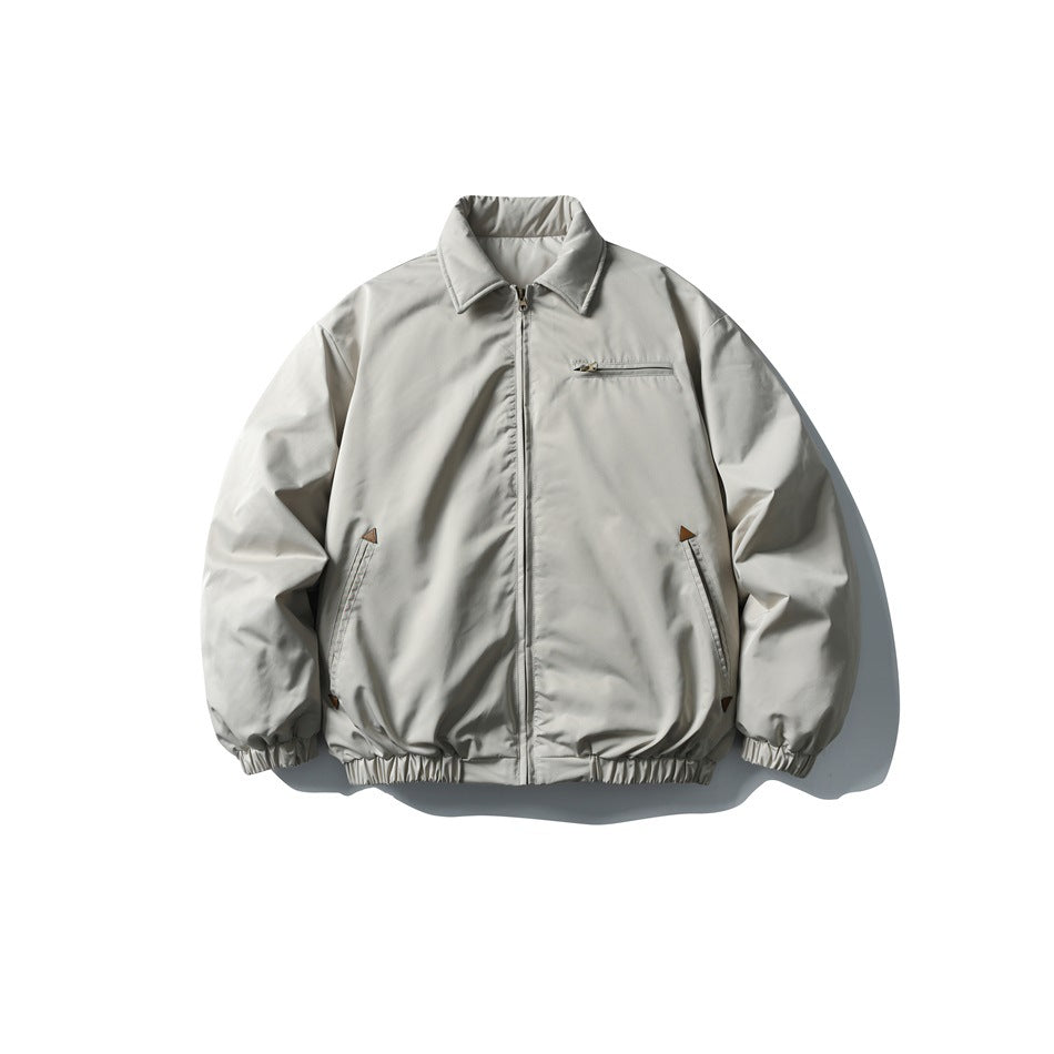 Light grayish-white padded bomber jacket, front view, with collar, zipper, chest zip pocket and elastic cuffs